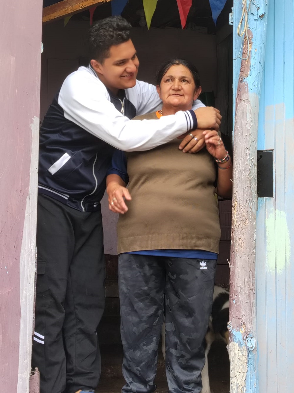 foto de familia beneficiaria de pagos de IMG